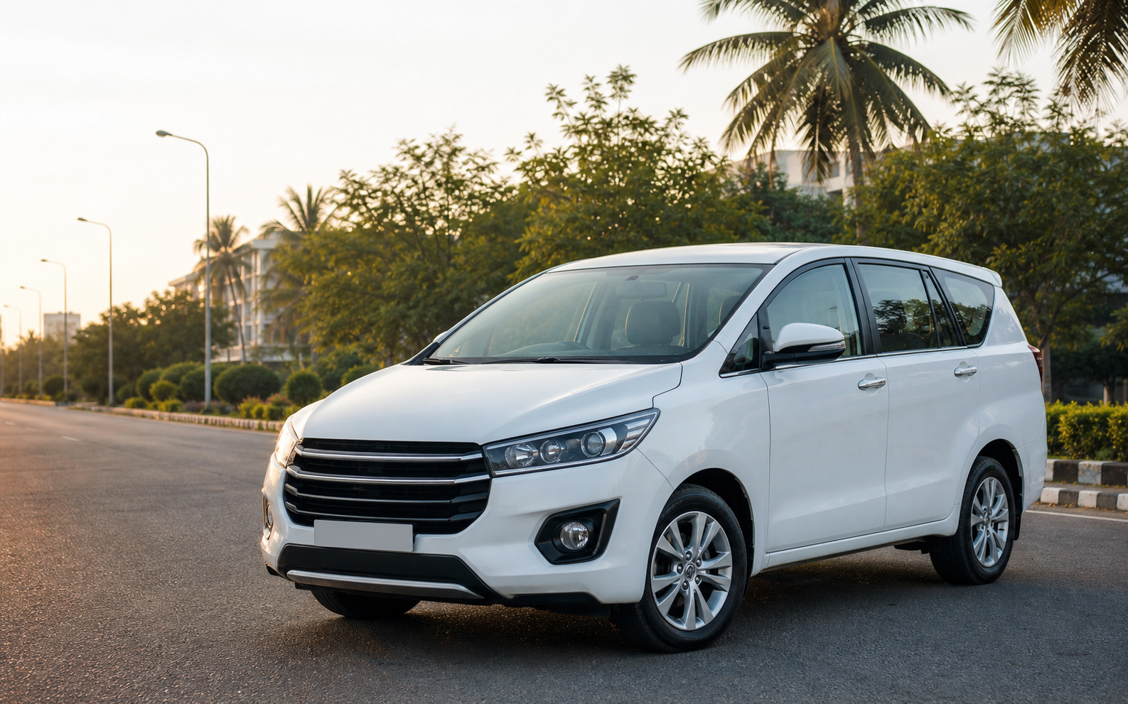 Illustrative white premium MPV on a Chennai road.